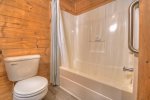 Bathroom in the lower level with a tub shower combo 